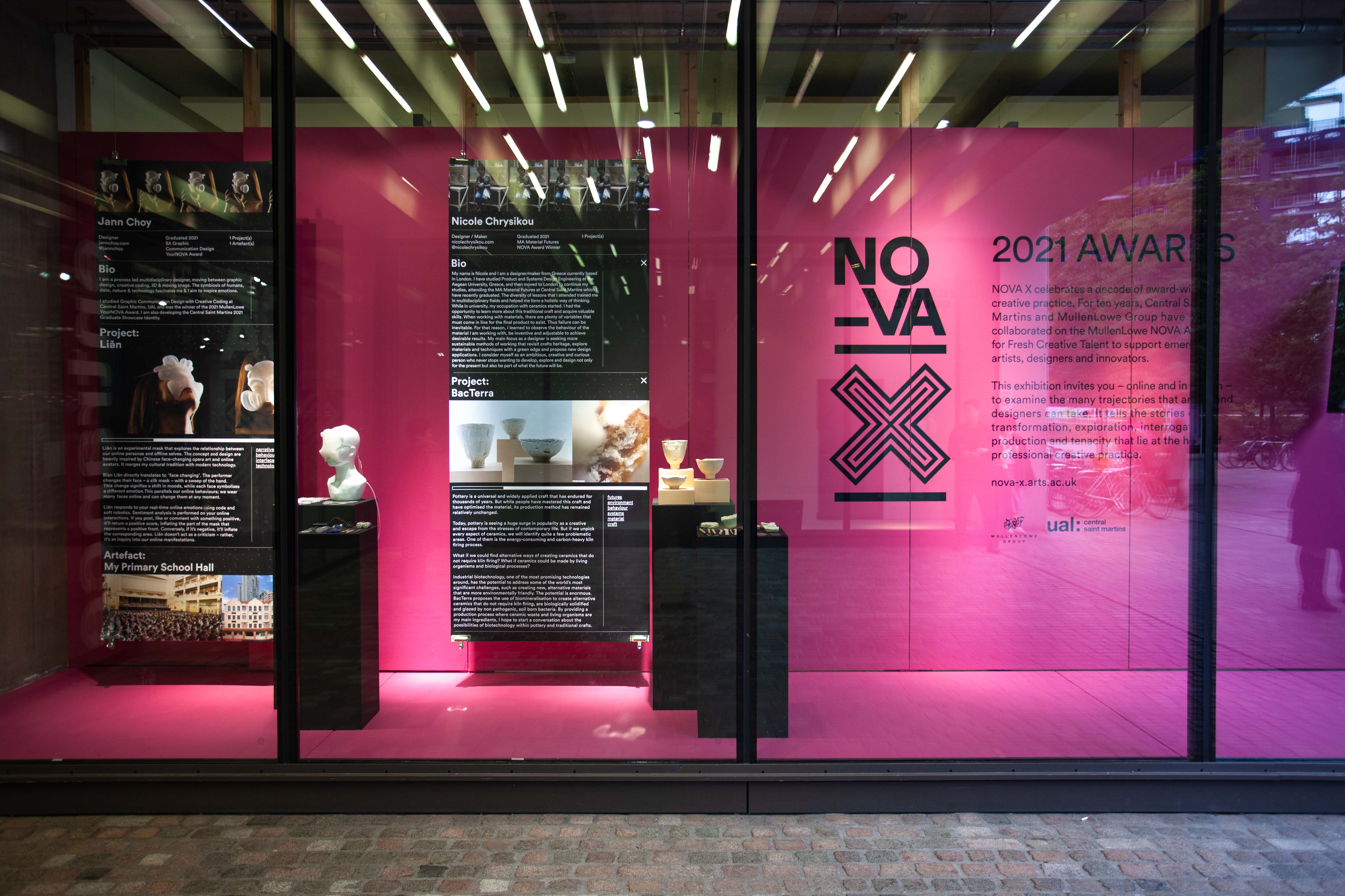 Nova X exhibition, a pink walled showcase with two pieces of work on display.